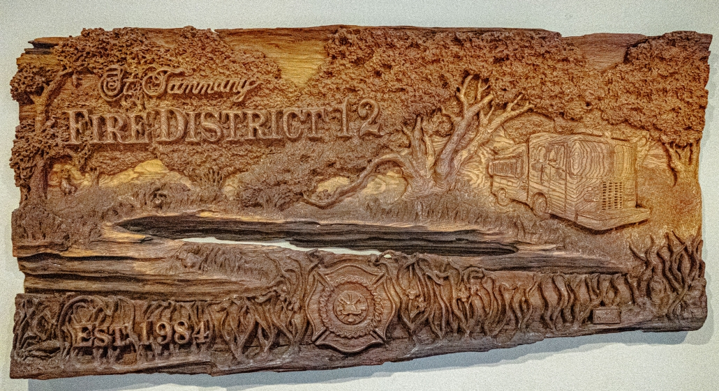 wood plaque carving for St. Tammany Fire District 12 of engine, emblem, oak trees